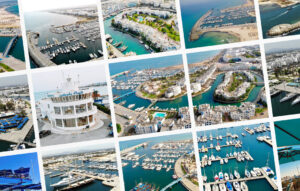 Port Yasmine Hammamet, panorama aérien : Infrastructures nautiques, résidences et côte méditerranéenne par ink conception.